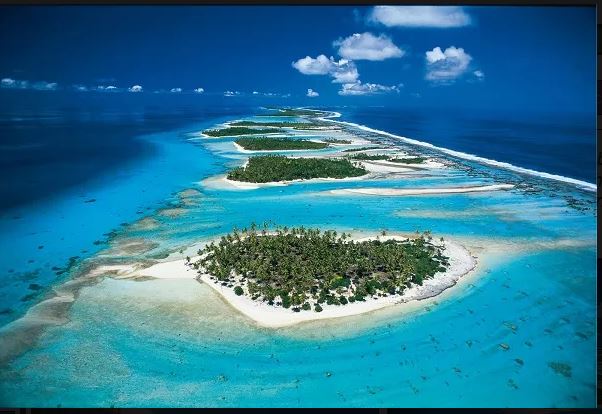 Tuamotus typical fringing reef islands